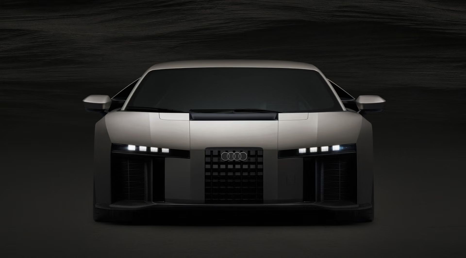 Vorderansicht des Audi Nuvolari, die seine markante Lichtsignatur und sein aerodynamisches Design hervorhebt.