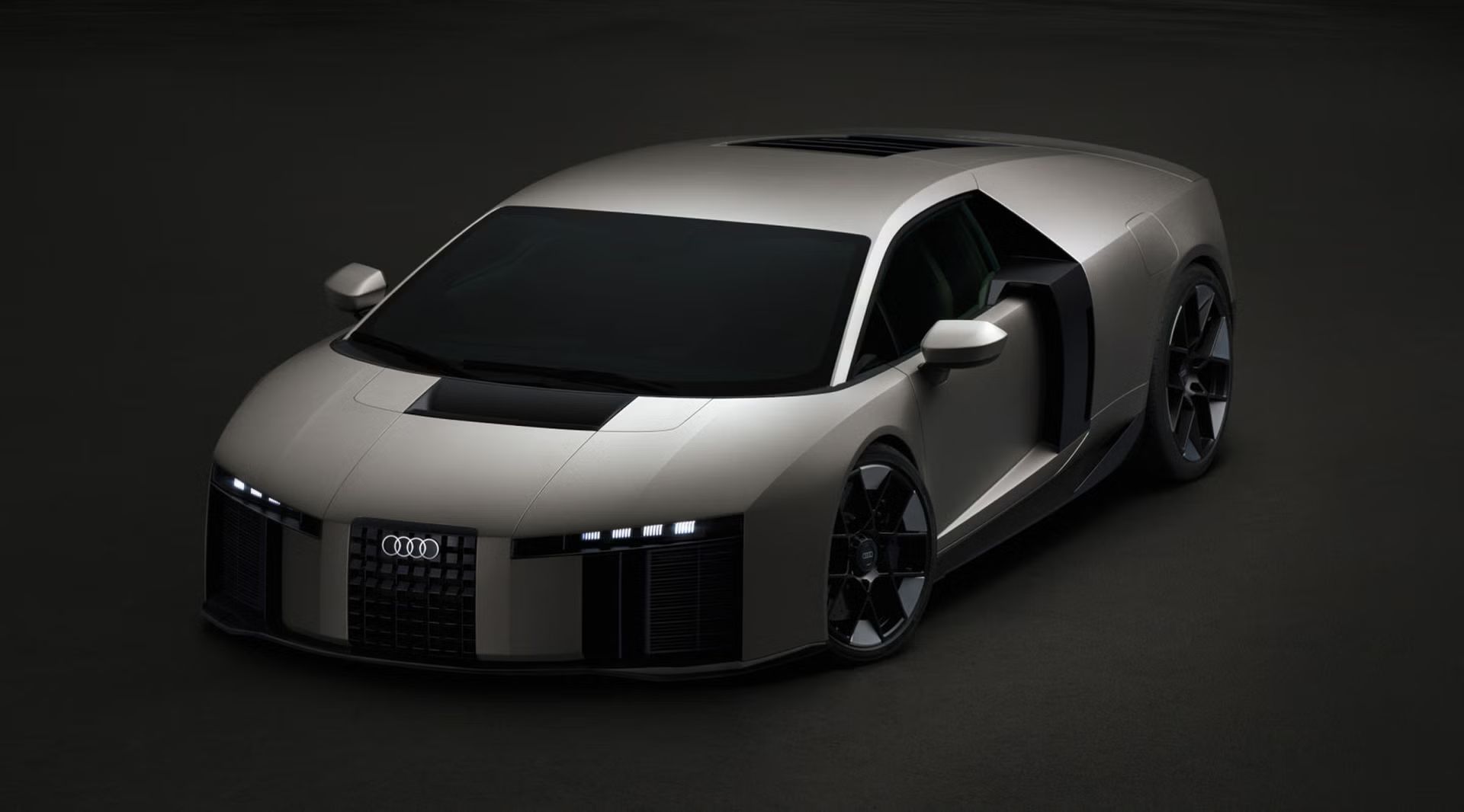 Vordere Dreiviertelansicht des Audi Nuvolari, die seine tiefe Bauweise, die markante Lichtgestaltung und die plastisch geformte Karosserie hervorhebt.