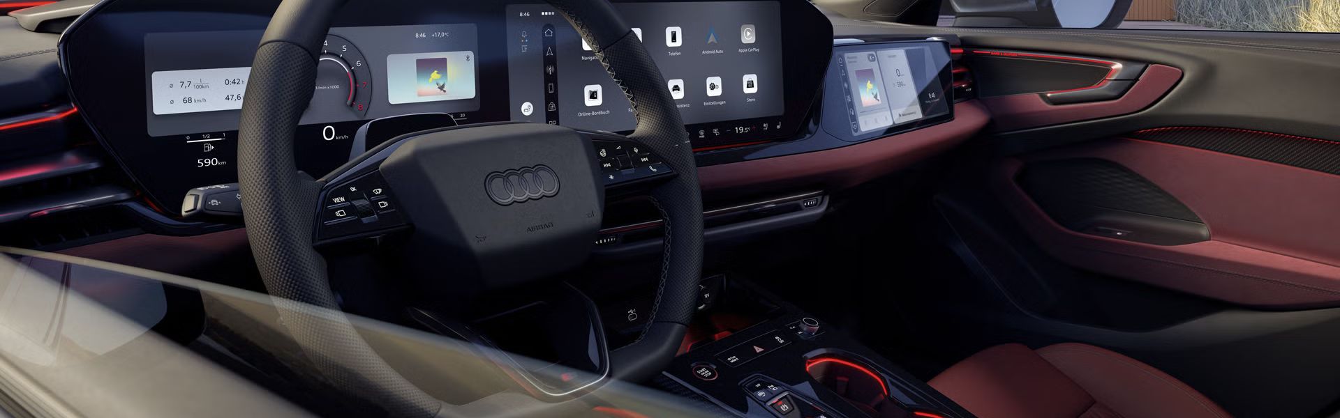 Innenraum und Cockpit des S5 Avant aus der Perspektive des Fahrerfensters. Der Innenraum leuchtet in rotem Ambiente Licht. 