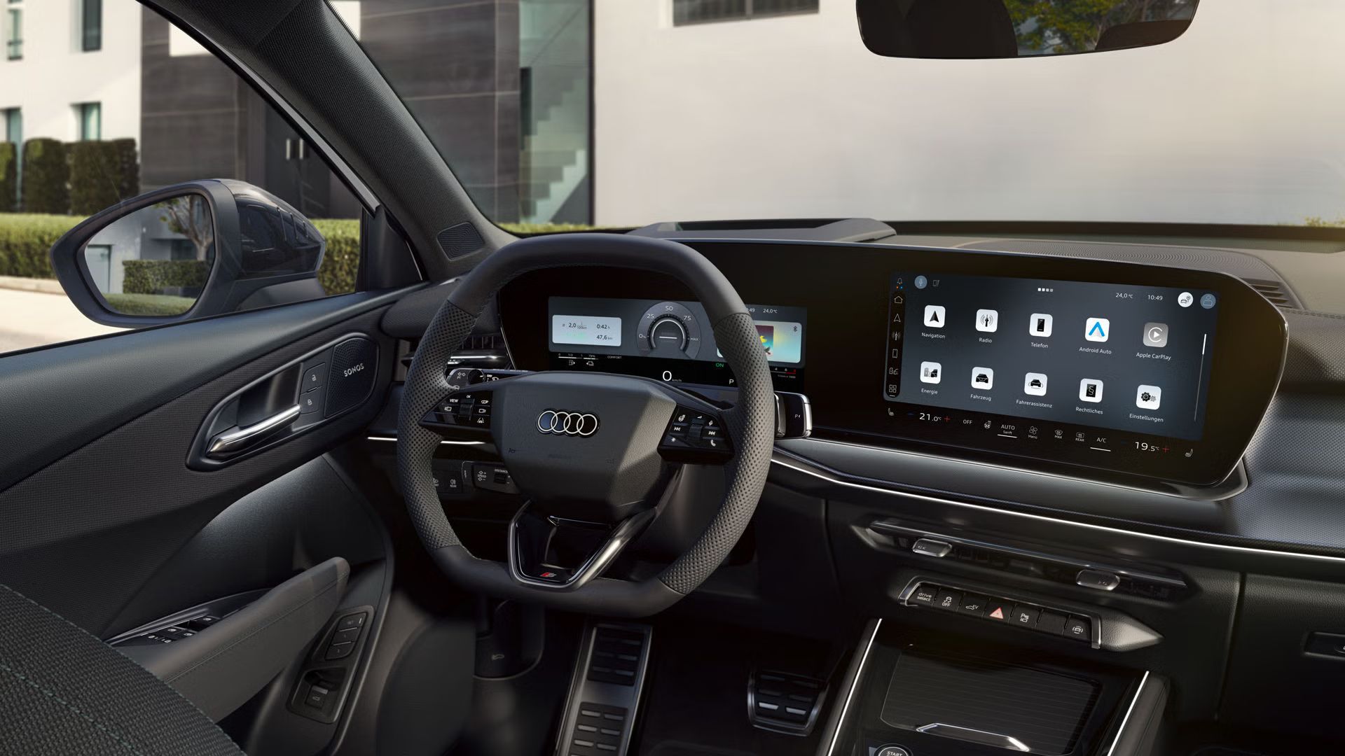 Das Cockpit des Q3 SUV e-hybrid mit Fokus auf die Fahrerarmatur und das Panoramadisplay.