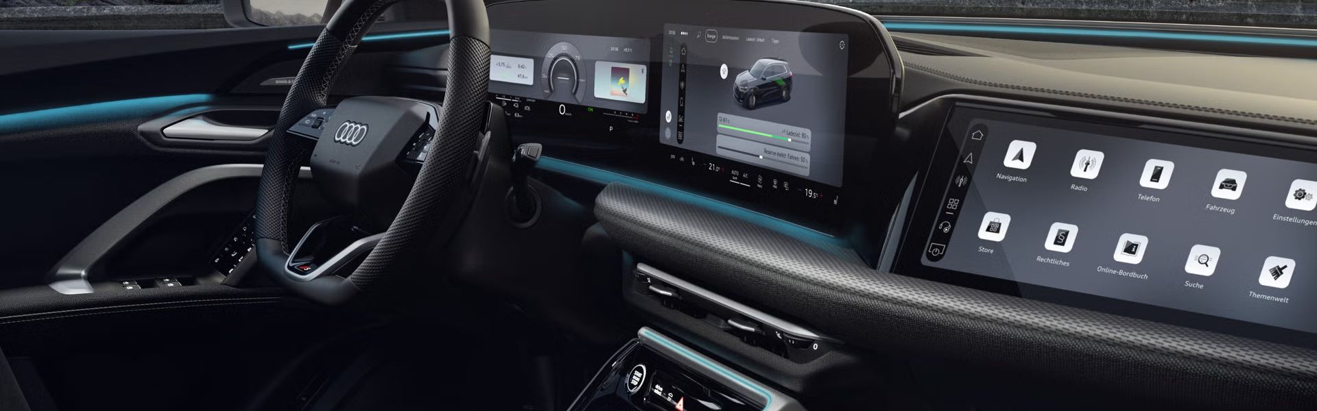 Blick in das Cockpit des Q5 SUV e-hybrid. Zu sehen sind unter anderem das Panoramadisplay und das MMI Beifahrerdisplay, sowie das Interaktionslicht am unteren Rand der Windschutzscheibe.