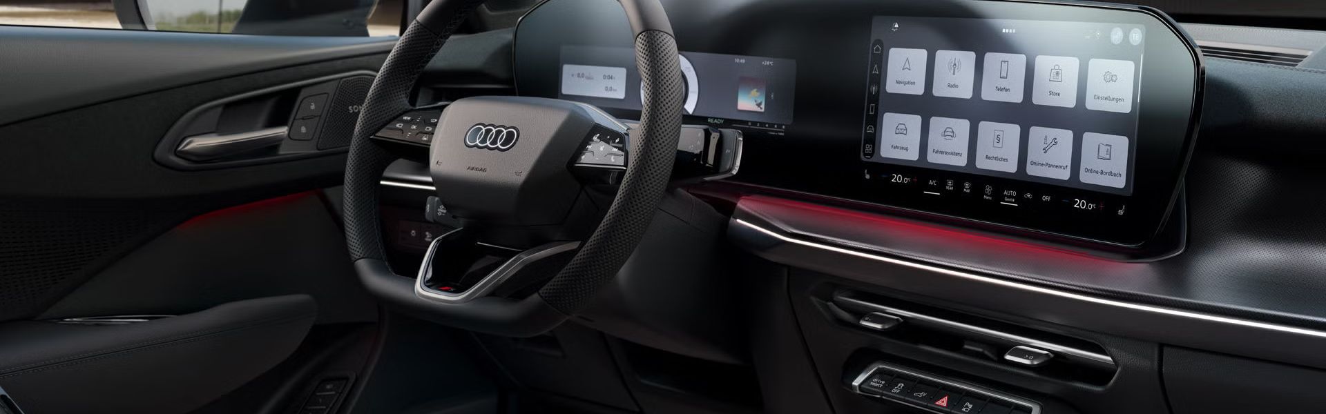 Das Cockpit mit Fokus auf Lenkrad, Panoramadisplay und Ambient-Lichtpaket	