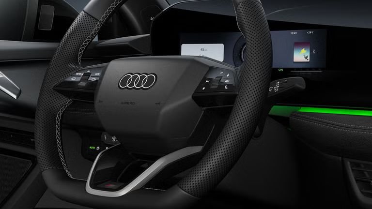 Innenaufnahme des Audi A3 allstreet mit Fokus auf das Lenkrad.