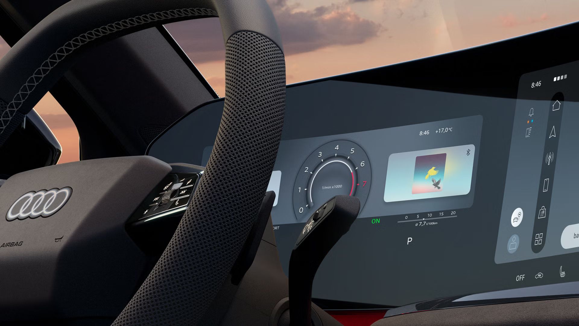 Nahaufnahme des Lenkrads und des Fahrerdisplays im Cockpit. 