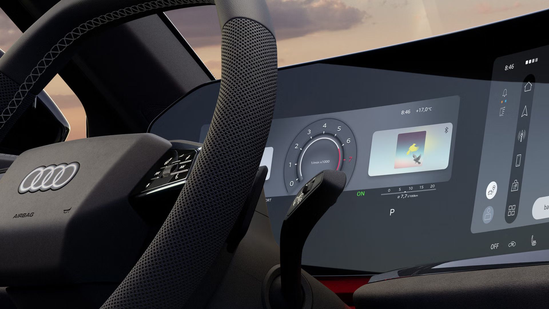 Nahaufnahme des Lenkrads und des Fahrerdisplays im Cockpit. 