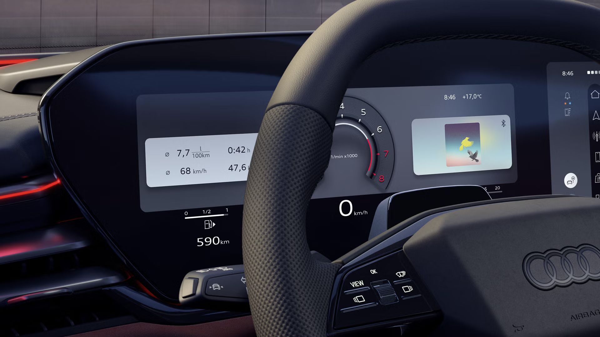 Nahaufnahme des Lenkrads und des Fahrerdisplays im Cockpit. 