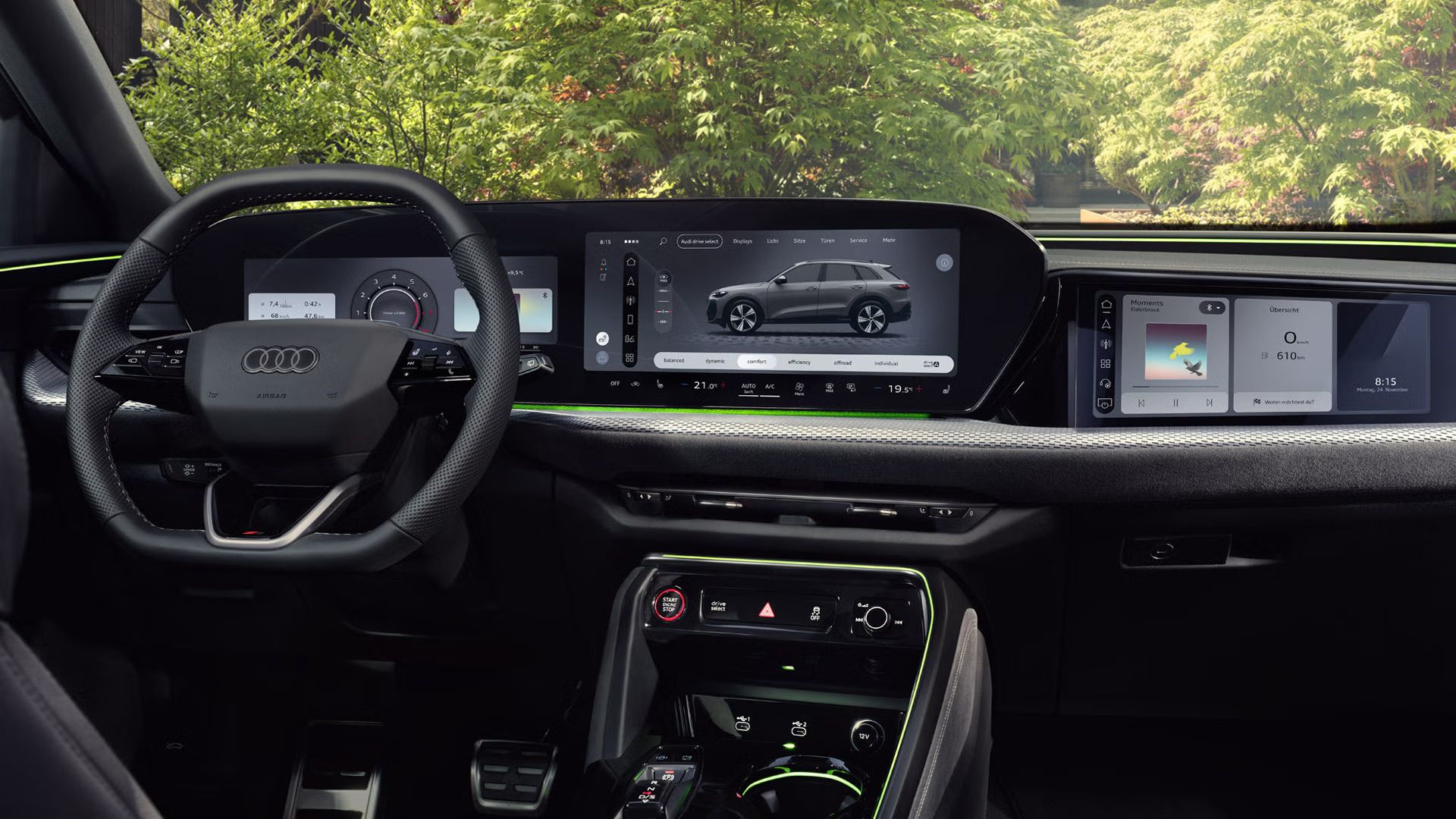 Blick von der Rückbank in das Cockpit des Q5 SUV. Im Fokus steht das Panoramadisplay mit dem Audi Virtual Cockpit und dem MMI Display.	