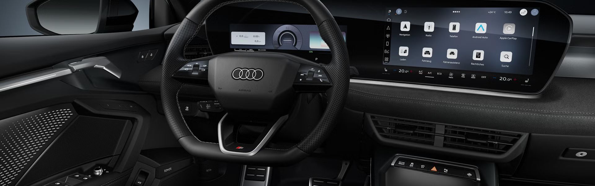 Frontale Sicht auf das Sportlederlenkrad und das geschwungene Panoramadisplay im Audi A3 Sportback e-hybrid.