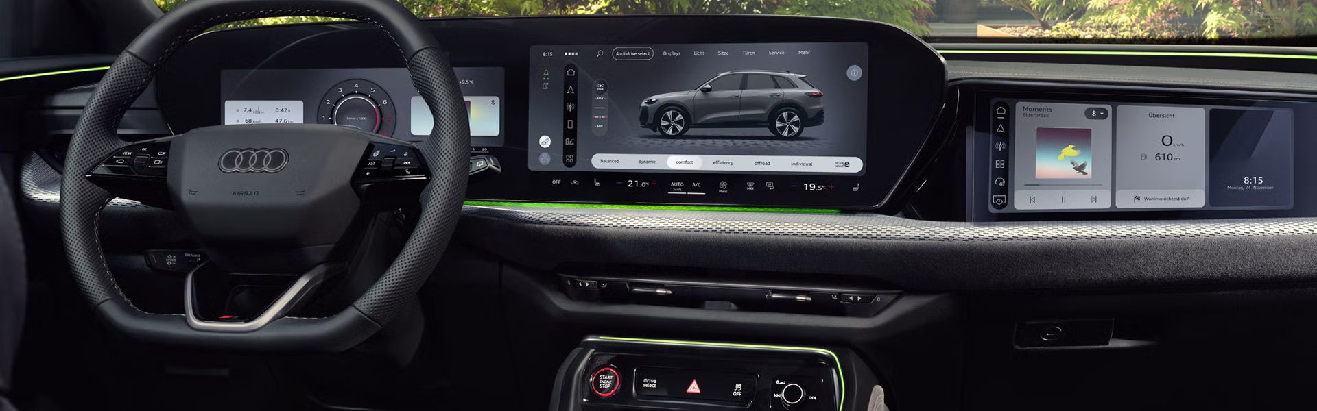 Blick von der Rückbank in das Cockpit des Q5 SUV. Im Fokus steht das Panoramadisplay mit dem Audi Virtual Cockpit und dem MMI Display.	