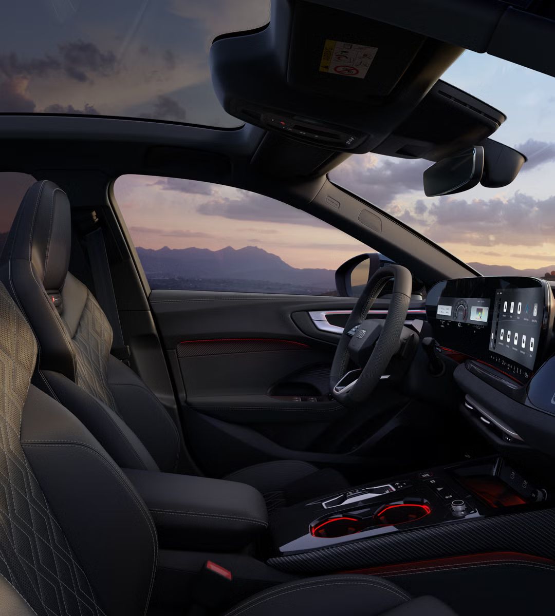 Das Cockpit der S5 Limousine aus Beifahrerperspektive mit Fokus auf dem Lenkrad und dem Panorama-Display. 