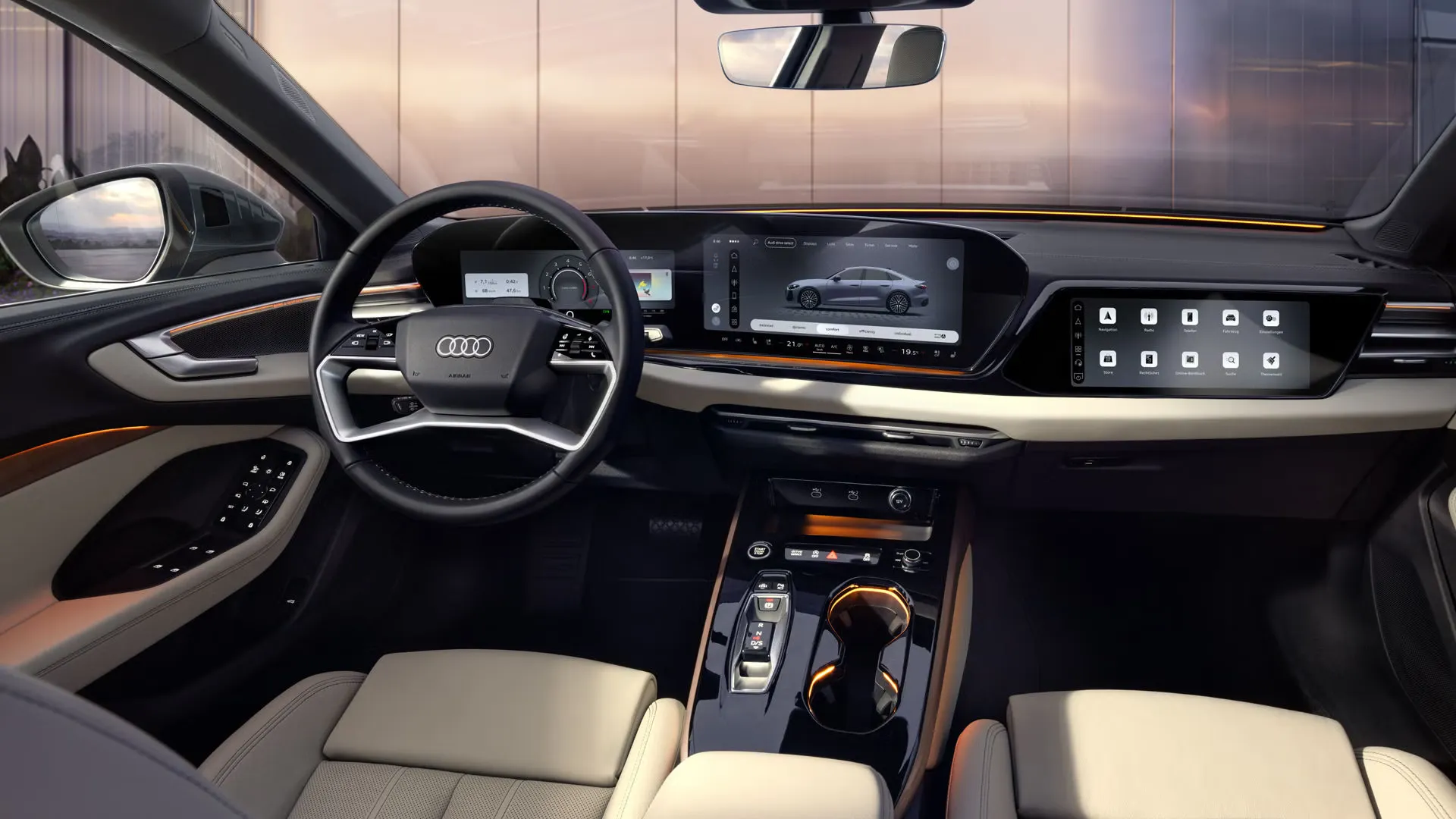 Blick von der Rückbank in das Cockpit der A5 Limousine. Zu sehen sind unter anderem die MMI Displays und das Lichtdesign mit dem Interaktionslicht am unteren Rand der Windschutzscheibe.
