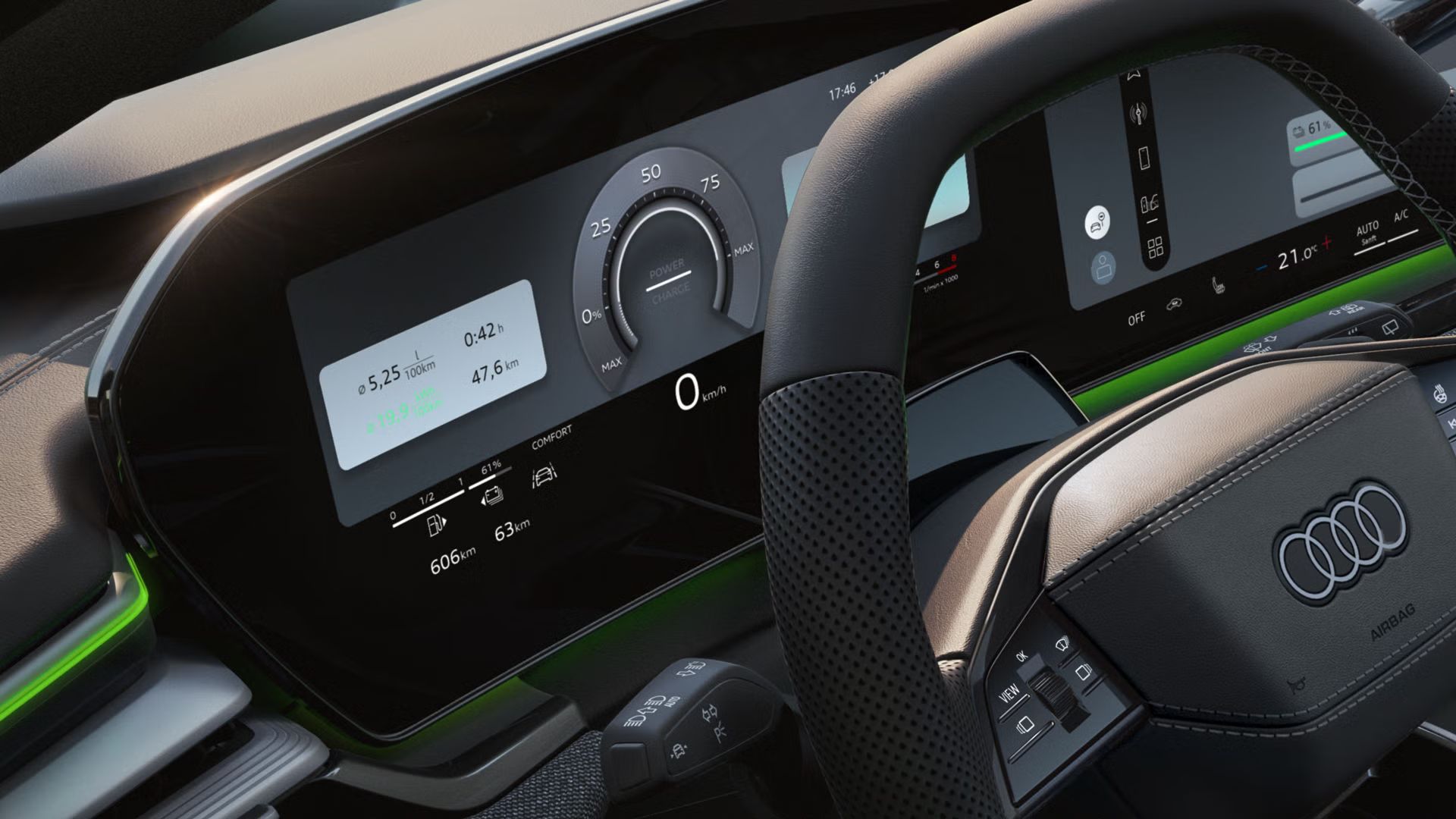 Blick auf das Lenkrad und das Fahrerdisplay des A6 Avant e-hybrid.
