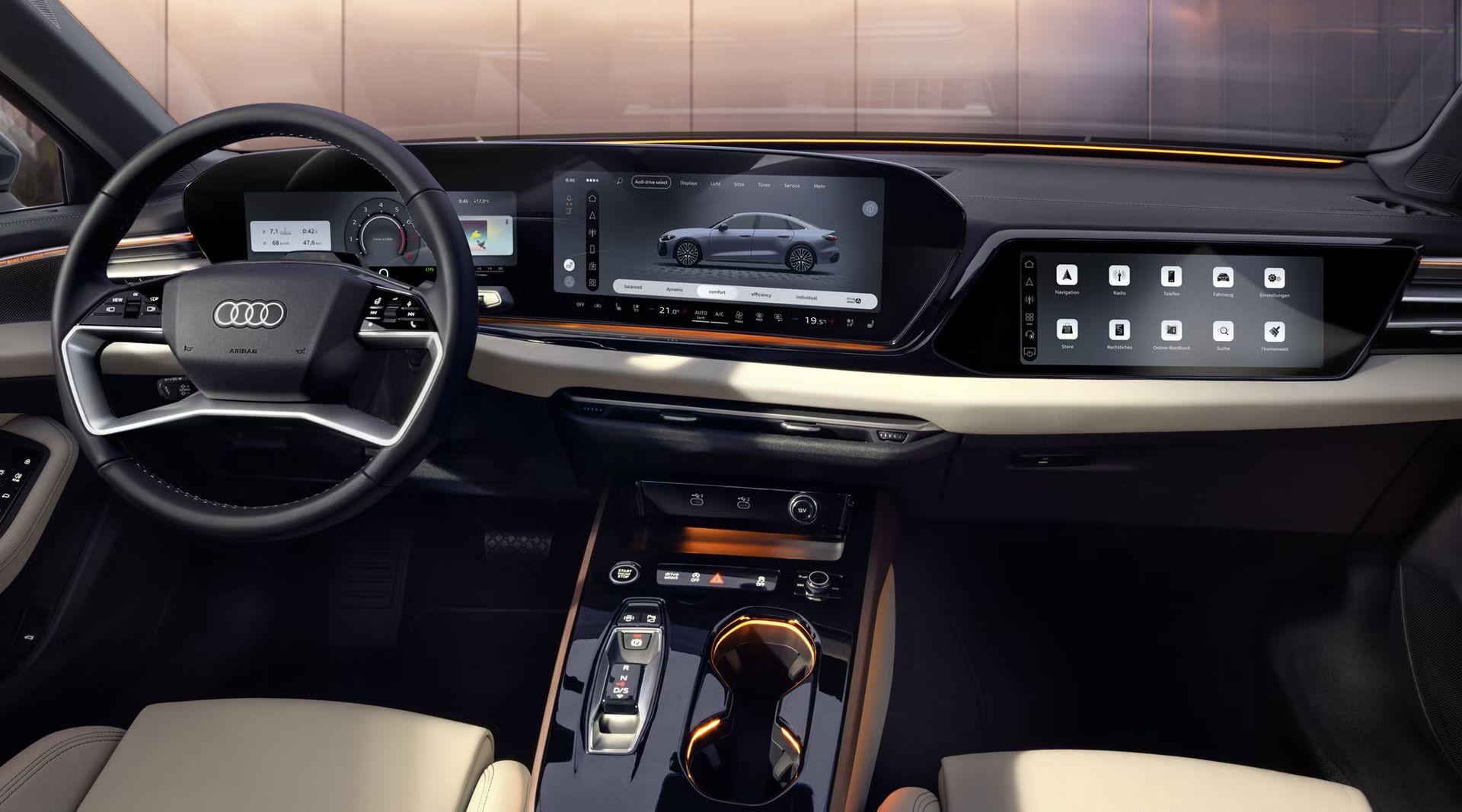 Blick von der Rückbank in das Cockpit der A5 Limousine. Zu sehen sind unter anderem die MMI Displays und das Lichtdesign mit dem Interaktionslicht am unteren Rand der Windschutzscheibe.