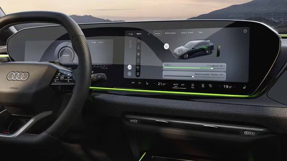 Nahaufnahme des MMI-Displays im A6 Avant e-hybrid. Auf diesem wird der aktuelle Ladezustand sowie ein Slider zur Regelung der Reserve angezeigt.