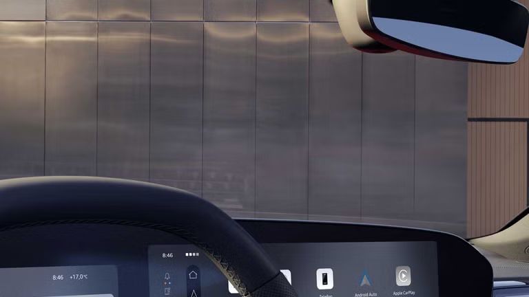 Innenraum und Cockpit des S5 Avant aus der Perspektive des Fahrerfensters. Der Innenraum leuchtet in rotem Ambiente Licht. 